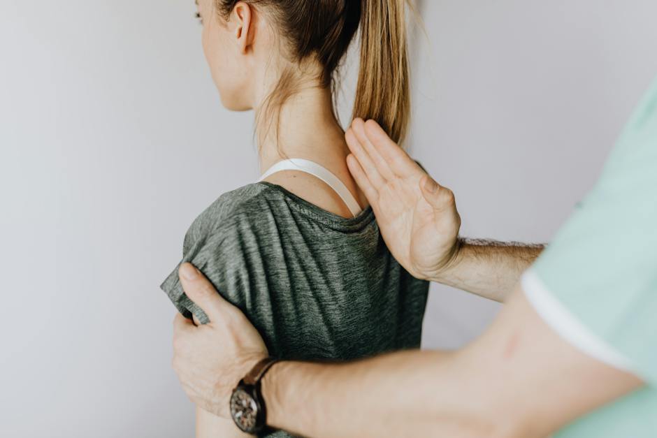 A person receiving chiropractic care, showing the spine being adjusted by the chiropractor.